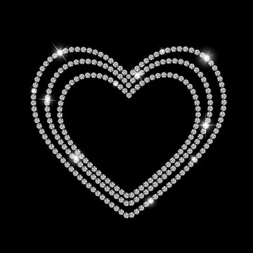 Three layered heart shape made of sparkling diamonds on black background romantic jewelry design