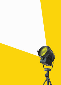 Flat design. Retro big stage light, searchlight with spot light - film camera. Vintage cinema poster with copy space.