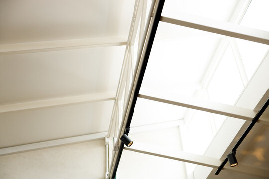 Window with light permitting in the white color roof.