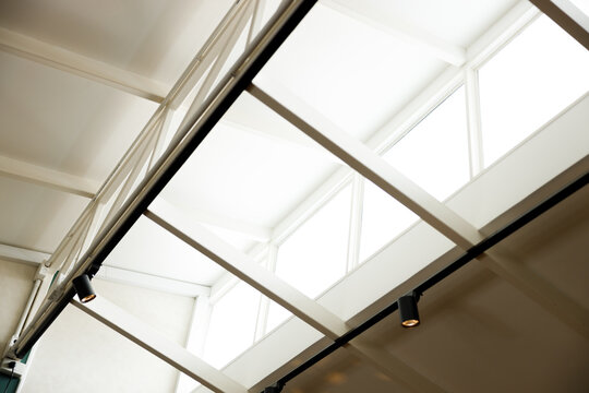 Window with light permitting in the white color roof.