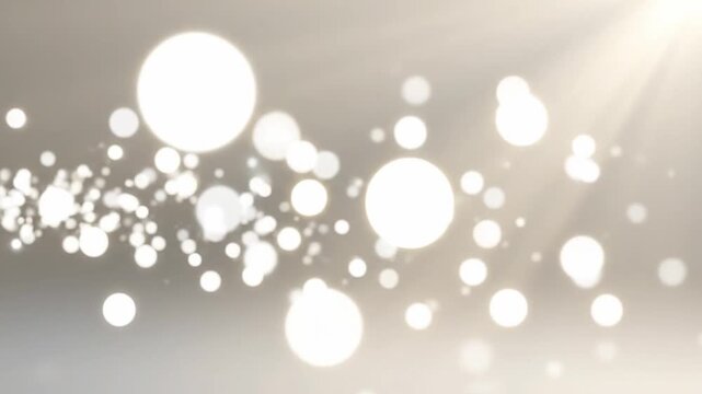 Soft focus light effect background with bokeh and subtle light rays, perfect for a serene and elegant visual