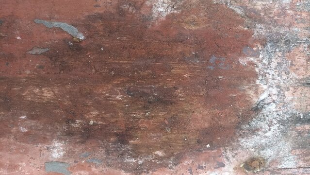 Peeling Paint Texture Background of an aged red wooden board with chipped paint and worn details, ideal for vintage-inspired designs, posters, packaging, and creative backgrounds