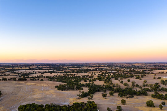 Vast semi-arid countryside glowing at sunset