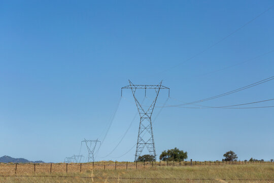 transmission tower electricity pylons in rural Australia transporting power through country