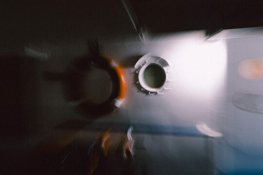 Orange life ring hanging inside the boat in motion blur effect