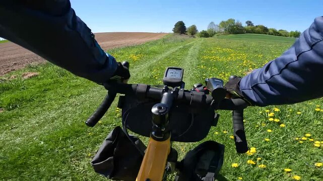 Gravel bicycle ride on the road in the summer season