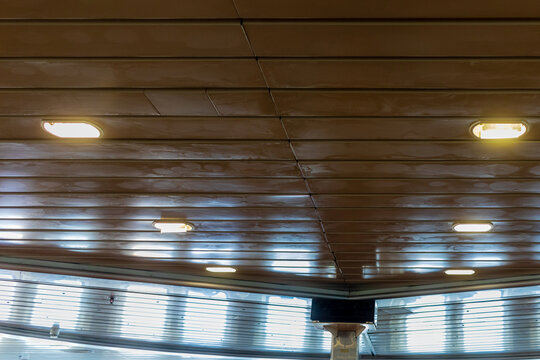 Modern Wood Panel Ceiling With Recessed Lights Inside Ferry Interior Lounge Deck