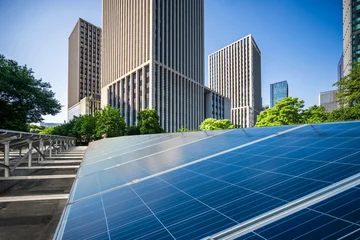 Harnessing Renewable Energy: Solar Panels Amidst Urban Skyscrapers © evening_tao
