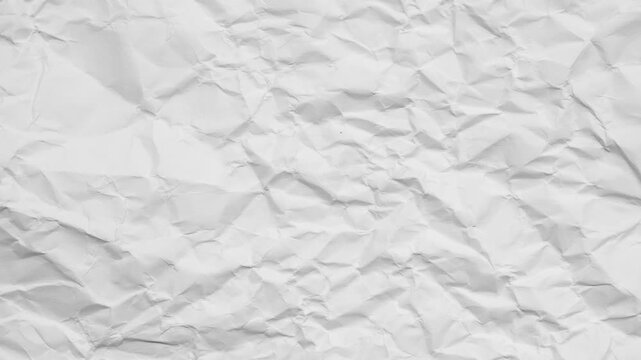 white crumpled and creased paper sheet texture background