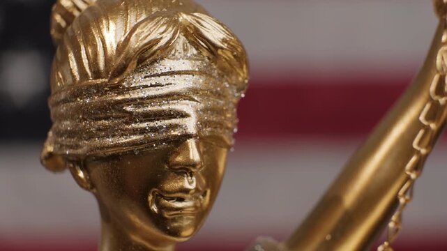 Portrait of Justice Themis Statue with blindfold symbolizing incorruptibility and impartiality in judgments close-up