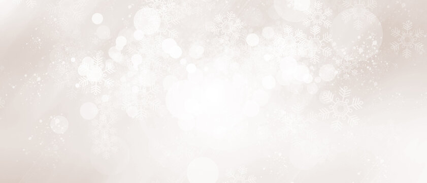 Blurred glitter effects background. Bright soft blue with hints of pearl color. Christmas background. Festive Christmas backdrop with holiday charm. Blurred bokeh light on dark blue background.