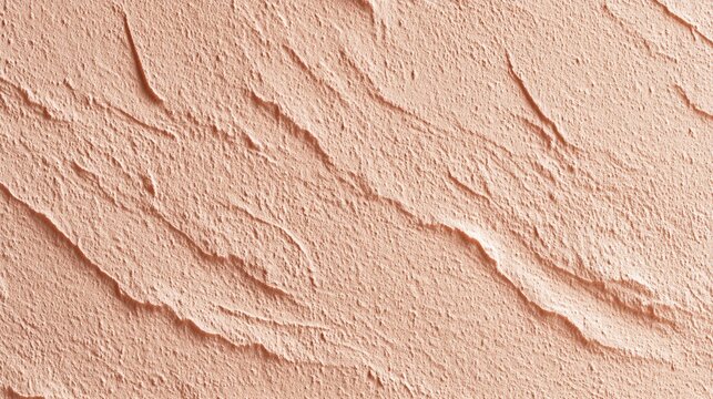 Close-up of a textured, peach-colored wall surface with rough, uneven plaster and natural cracks an abstract pattern, texture pink background