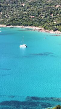 Corsica France panoramic view of beautiful coast with turquoise water bay and boats at sunny day.