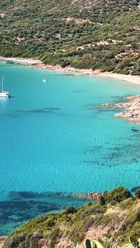 Corsica France panoramic view of beautiful coast with turquoise water bay and boats at sunny day.