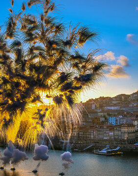 Display of smoke bombs on the river Douro in the city of Porto, Portugal, uring the St. John's festivities