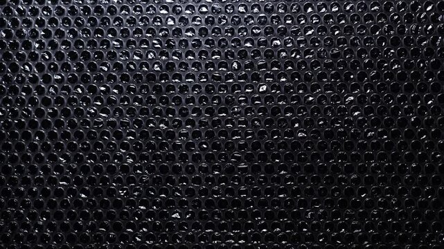 Dark Bubble Wrap Texture with Small Glossy Air Bubbles