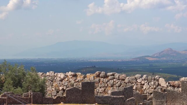 Ancient Mycenaean ruins overlooking the Argolis landscape