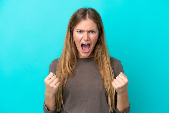 Young blonde woman isolated on blue background frustrated by a bad situation