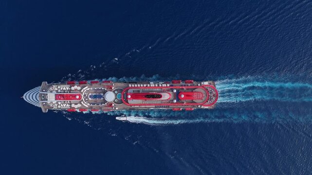Aerial luxury liner voyage. Ship top view. Luxury liner resort. Cruise ship voyage. Entertainment deck. Take a cruise. Aerial top view of cruise summer vacation. Cruise ship tour and travel at sea