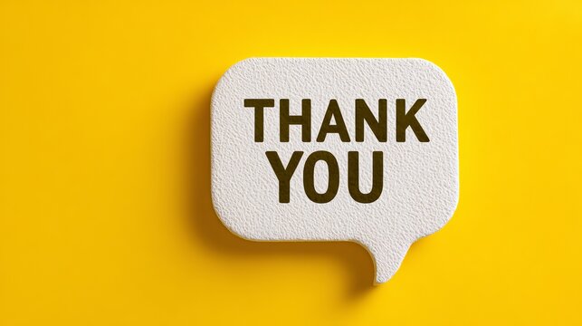 Thank you message on a white speech bubble against a vibrant yellow background, expressing gratitude and appreciation