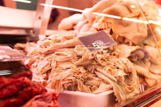 Raw cow tripe on counter of butcher shop