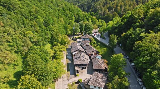 Etar Bulgaria aerial view drone shot, Etara ethnographic open air museum Gabrovo, traditional Bulgarian national revival architecture village houses summer landscape travel destination