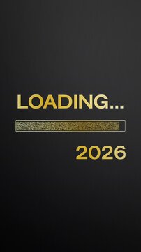 Vertical video animation of loading bar in gold with the message loading 2027 over dark background - new year concept - represents the new year 2027.