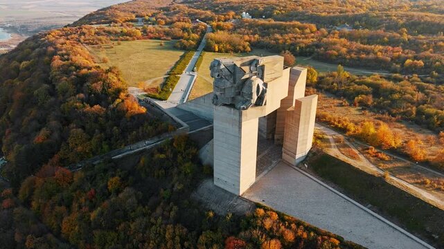 Founders of Bulgarian State monument Shumen aerial view drone shot sunset, 1300 Years of Bulgaria memorial park, brutalist architecture stone sculpture autumn landscape travel destination