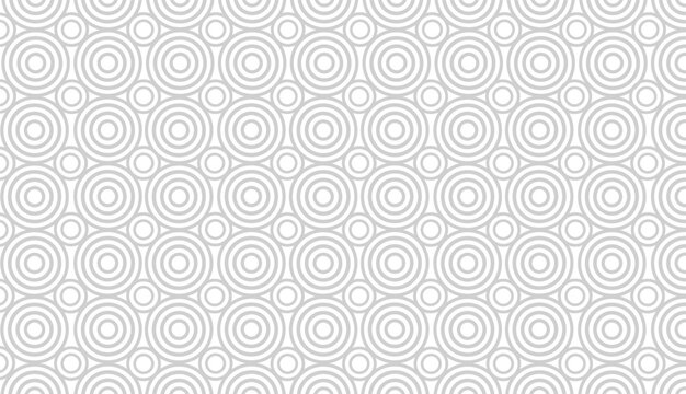 Minimalist geometric pattern of concentric circles in light grey tone.