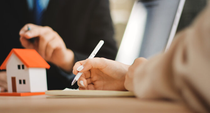 Rental agreement, Sale agent deal to agreement successful home loan contract with customer and sign agreement contract Insurance home concept..