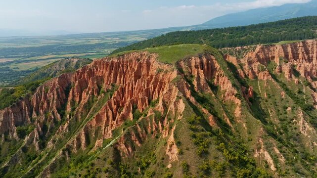 Stob Pyramids Bulgaria aerial view drone shot summer, Rila mountain earth pyramids rock formations, Bulgarian natural landmark valley landscape travel destination background