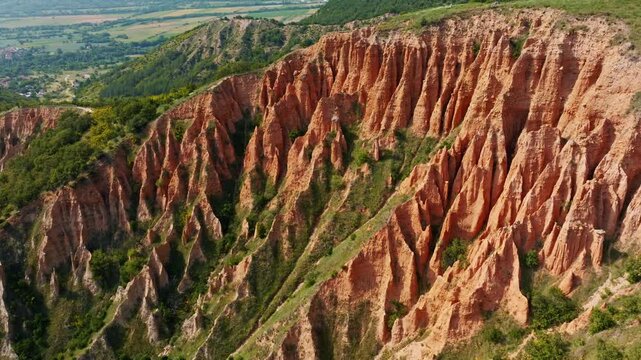 Stob Earth Pyramids Bulgaria close up aerial view drone shot, Rila mountain sandstone pillars erosion texture, rock formations cliff abstract nature background