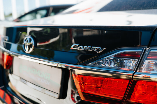 The Toyota Camry is parked at a dealership lot where customers can view the car.  Smolensk, Russia 07.17.2026