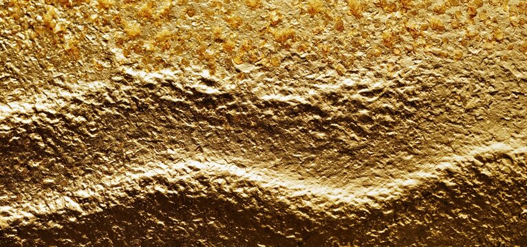 Elegant hammered gold foil texture shown from above, ideal for sophisticated holiday designs and premium festive branding.