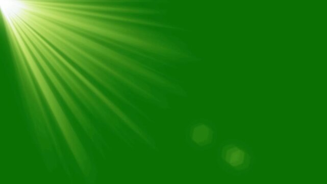Top left side sun rays on green screen. bright light lens flare effect, Beams lights on stage with green screen background. Top center sun rays or god bless rays on green screen. flashing light effect