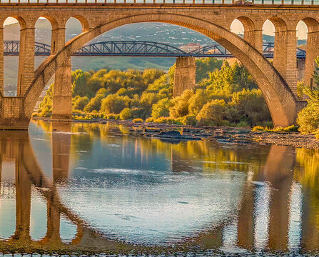 Closeup of the sublime arches of the Regua Road Bridge with the metal pedestrian bridge in the background, Peso da R&eacute;gua, Portugal