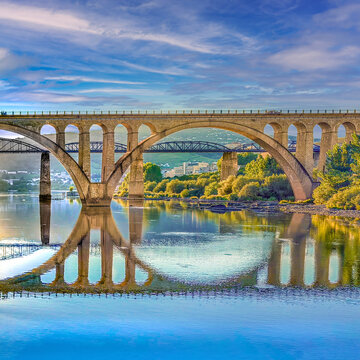 Spanning the Douro River at Peso da R&eacute;gua, the Regua Road Bridge and the metal pedestrian bridge, Portugal