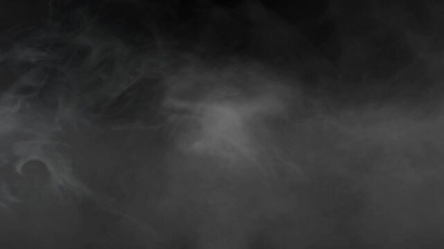Dense white smoke clouds swirling against a dark black background for atmospheric overlay effects