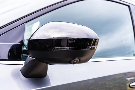 Car Side Mirror With Camera Driver Assistance System And Turn Signal Close Up