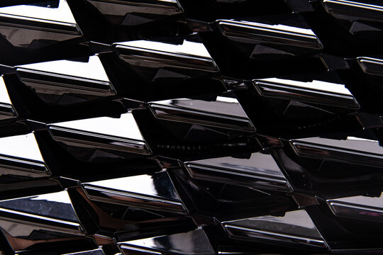 Glossy Black Car Front Grille Pattern Texture Close Up For Automotive Background