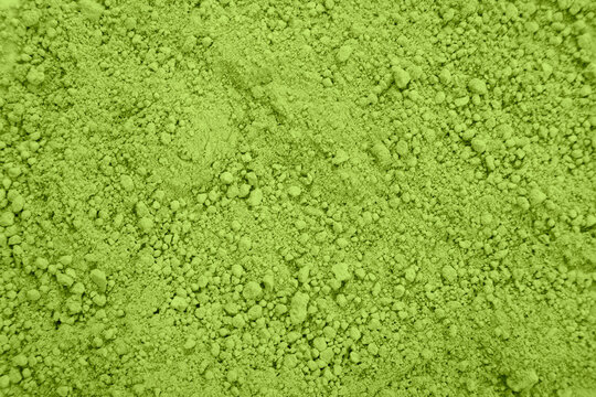 Green matcha tea powder texture background. Organic Japanese ground tea leaf for healthy drink and culinary ingredient. Natural antioxidant food product for cafe menu and detox diet