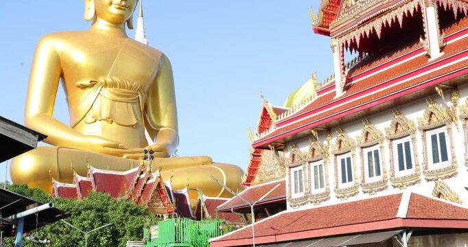 Big Golden Seated Buddha Statue (Buddha Dhammakaya Dhepmongkol) at Wat Paknam Phasi Charoen temple in Bangkok, Thailand