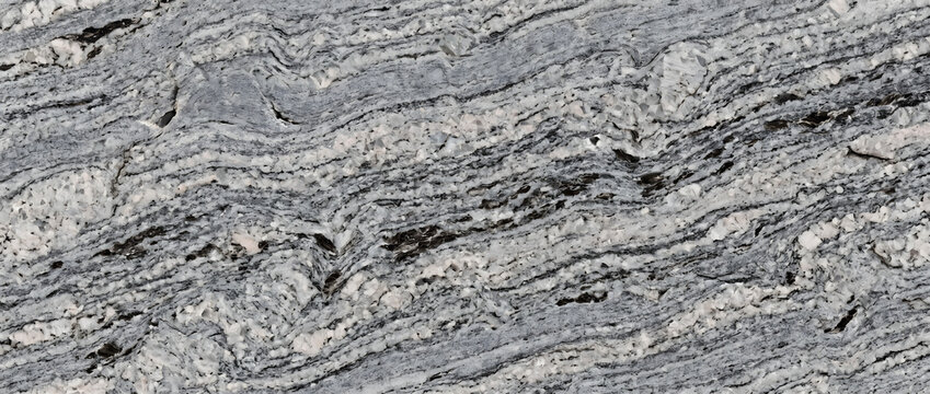 Marble texture displaying a polished grey mineral surface with intense organic wavy layers provides a luxury natural backdrop for high end design templates