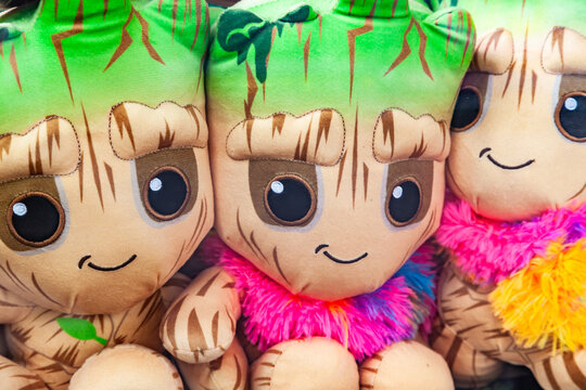 Frankfurt, Germany - May 15, 2026: Row of plush soft toys resembling Groot character from Guardians of the Galaxy at a fairground stall in Frankfurt