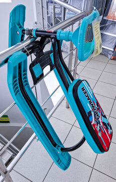 VORONEZH, Russia - February 21, 2026.Turquoise Nika Snowracer kids' winter sled on a display rack in a Russian supermarket