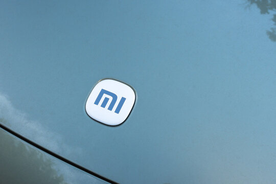 Almaty, Kazakhstan - June 10, 2026: Xiaomi logo on the hood of an electric car