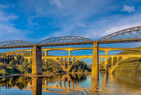 The three iconic bridges spanning the Douro River at Peso da R&eacute;gua, Vila Real, Portugal