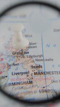 Exploring Edinburgh on a real paper map with a magnifying glass