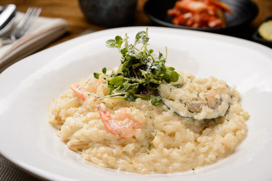Creamy seafood risotto with shrimp and herbs