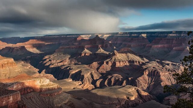 Canyon terrain timelapse shadows moving across layered rocks sunlight transitions over cliffs